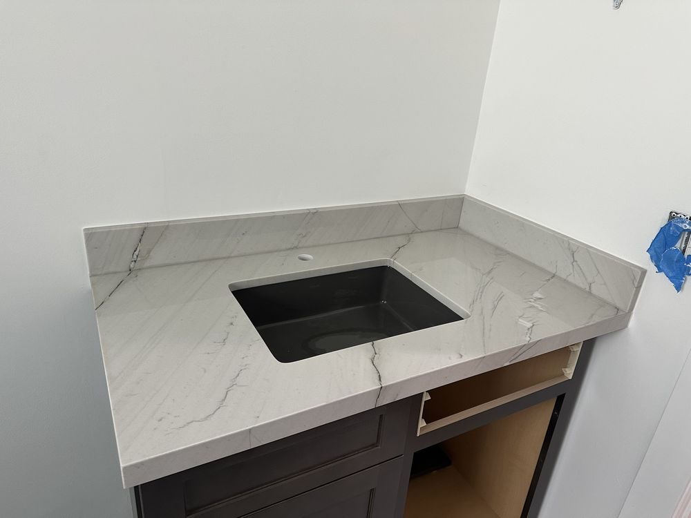 Stone countertop with an integrated cooktop